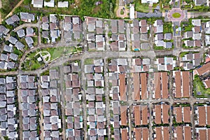 New development real estate. Aerial view of residential houses and driveways neighborhood during a fall sunset or sunrise time.