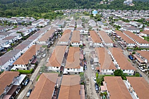 New development real estate. Aerial view of residential houses and driveways neighborhood during a fall sunset or sunrise time.