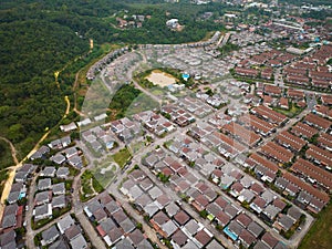 New development real estate. Aerial view of residential houses and driveways neighborhood during a fall sunset or sunrise time.