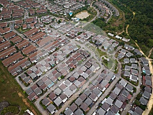 New development real estate. Aerial view of residential houses and driveways neighborhood during a fall sunset or sunrise time.