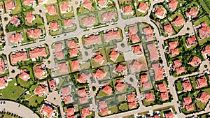 New development real estate. Aerial view of residential houses and driveways neighborhood during sunny day.Tightly packed homes.