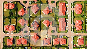 New development real estate. Aerial view of residential houses and driveways neighborhood during sunny day.Tightly packed homes.