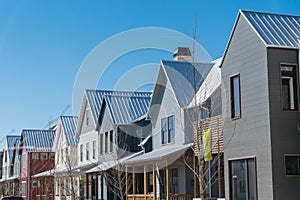 New development townhome with metal roof and covered gutters near Oklahoma City, US