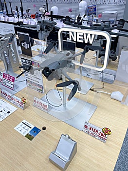 New DJI drones on display in electronics store