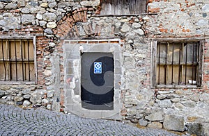 New door in an desolate old wall