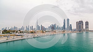 The new Dubai Water Canal with view on the city skyline timelapse, United Arab Emirates