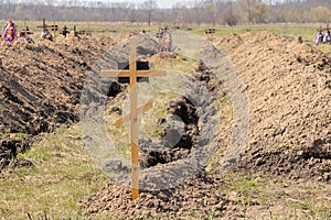 New dug graves, grave cemetery for those infected by coronavirus, Ukraine Dnieper city