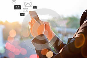 New E-mail Messages on Smartphones Users are replying to messages and connecting to global letter.