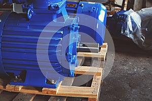 New electric motors of blue color of high power are in stock and ready for use.