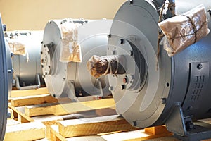 New electric motors of gray color of high power are in stock and ready for use.