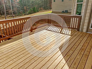 New Elevated Attached Wooden Deck with Railing