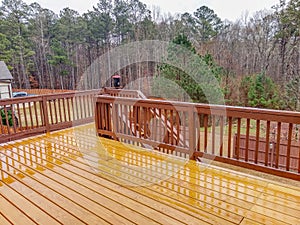 New Elevated Attached Wooden Deck with Railing