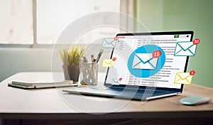 New email alert on laptop, communication connection message to global letters in the workplace.