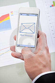 New email message icon on a mobile phone