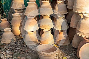 New empty clay flowerpot stacked in garden shop