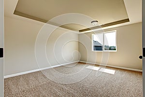 New empty room with beige carpet.