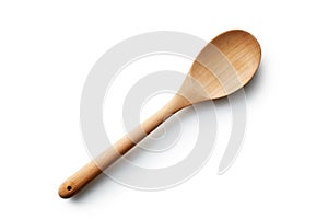 New empty wooden ladle isolated on white background