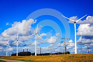 New energy from windmills, power lines and industry chimneys.