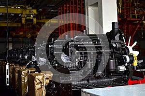 New engines for trucks and tractors on an industrial factory assembly line