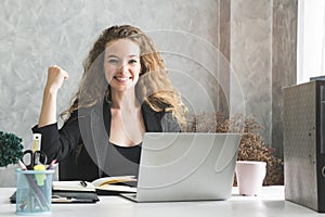 New entrepreneur showing confidence. confident and happy business woman sitting and smiling in the home office