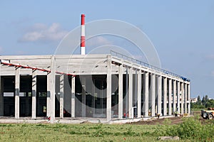 Factory construction site with workers