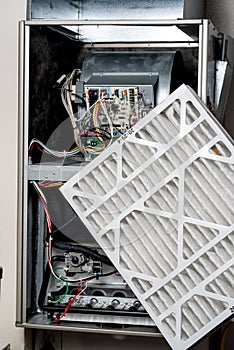 Replaceing a furnace filter with a new one