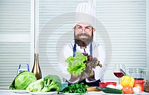 New food. Vegetarian. Mature chef with beard. Healthy food cooking. Dieting and organic food, vitamin. Bearded man cook