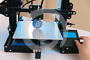 New generation of 3D printing machines printing a plastic part. For use in small spaces, offices or private use