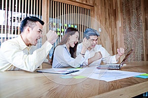 A new generation of Asian entrepreneurs sit for business planning meetings.