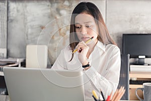 New generation business woman is working with a notebook