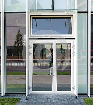 New glass windows and door  of a modern emty city office building