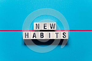 New Habits word concept on cubes