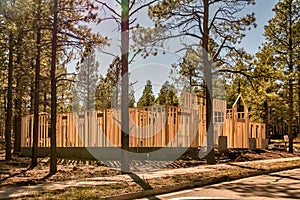 New home construction frame work among trees
