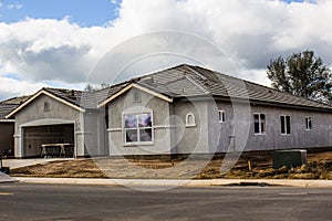New Home Construction With Stucco Completed