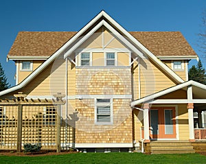 New Home Exterior Yellow Siding