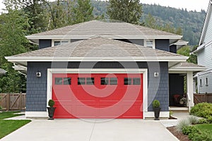 New Home House Exterior Blue with a Bright Red Garage Door Elevation