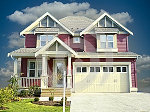 New Home House Exterior Burgundy Dramatic Blue Sky Construction