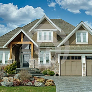 New Home House Exterior Grand Custom Brown Stucco Dwelling Double Garage