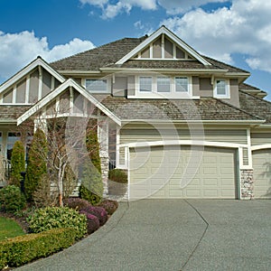 New Home House Exterior Large Custom Brown Stucco Dwelling Double Garage