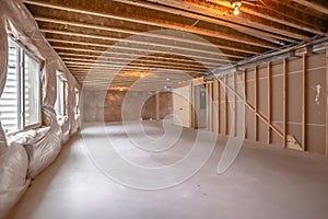 New home interior under construction with the wood framing visible