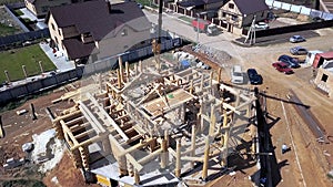 A new home under construction. Clip. Top view of the construction of a wooden house