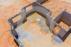 New home under construction with concrete blocks foundation