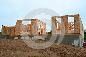 A new home under construction frame wood 2x4 rooms wood