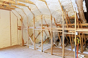 New home under construction with spray foam thermal hydro insulation