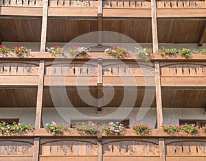 New hotel balconies decorated with flowers in Bansko, Bulgaria