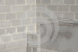 New house construction, building foundation walls using concrete blocks, copy space.