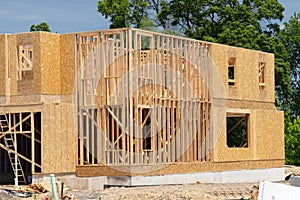 new house construction, framed walls plywood building lumber real truss