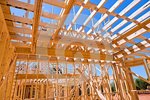 New house construction with wooden beams the ceiling and wall