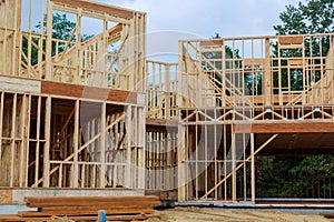 New house construction with wooden beams the ceiling and wall