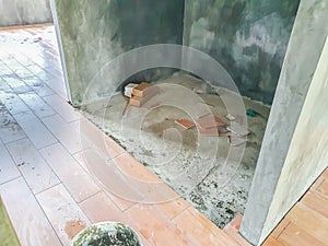 The new house is covered with red ceramic tiles with wooden patterns